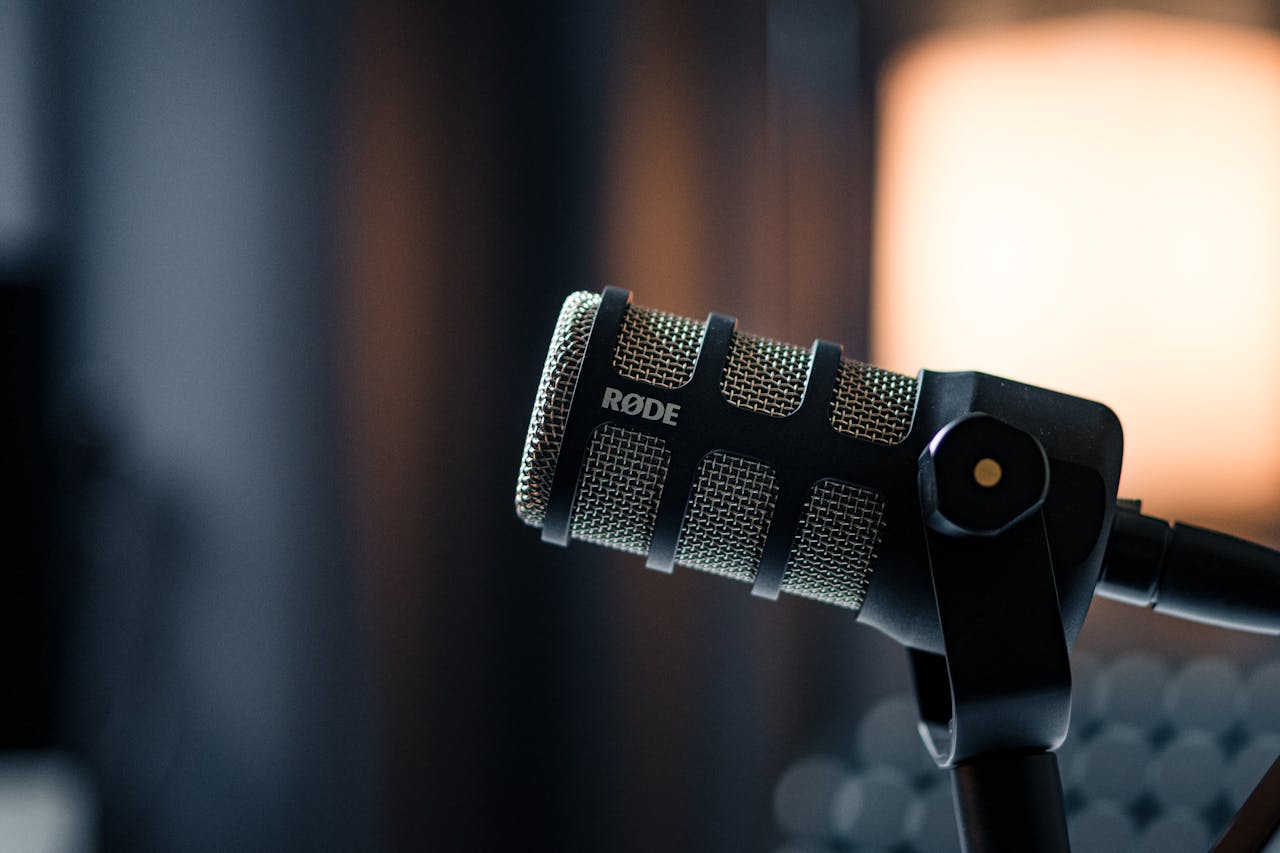 Home Close-up of a Rode microphone in a studio, emphasizing professional audio equipment.